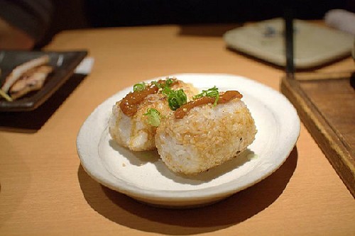 Com nam nuong Yaki Origini
