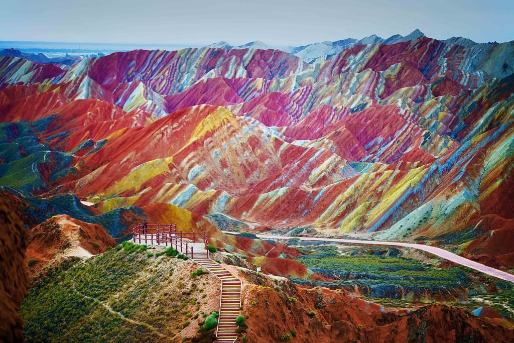 "A visitor stands at a viewing platform in the Zhangye Danxia Landform Geological Park in Zhangye, northwest Chinas Gansu province, 22 September 2012."